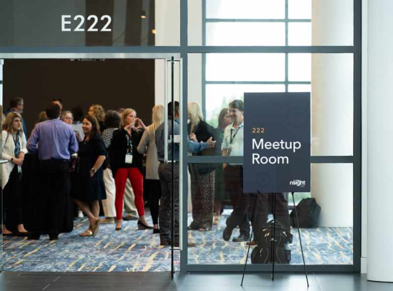 A group of people in a meeting room